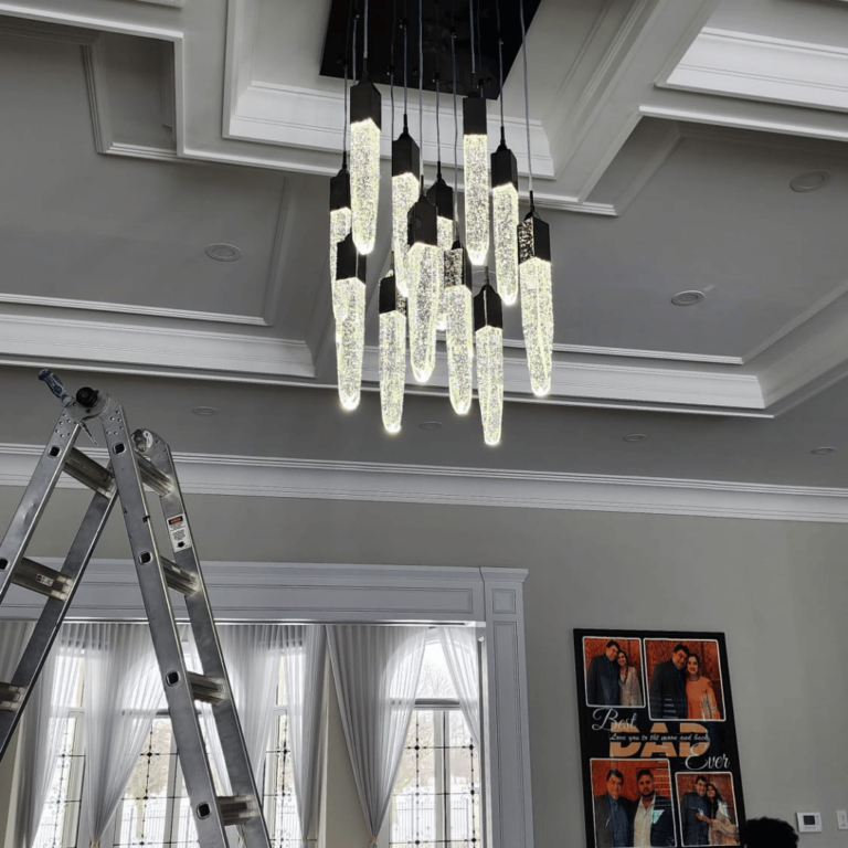 Stylish living room chandelier installation, designed for a touch of class and brightness.